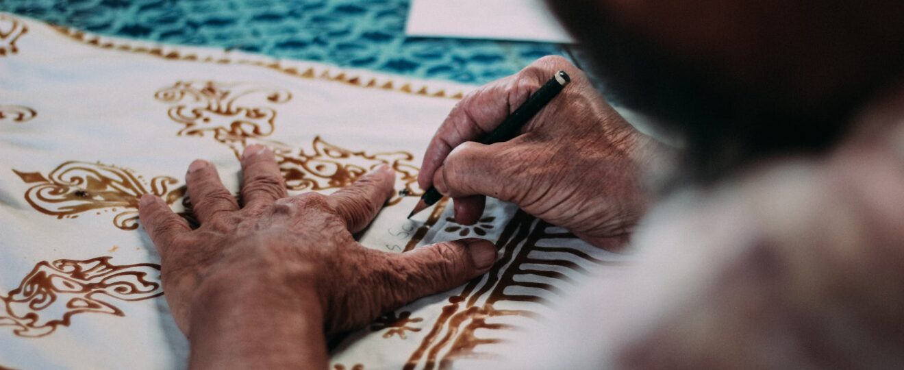 white and blue floral garment